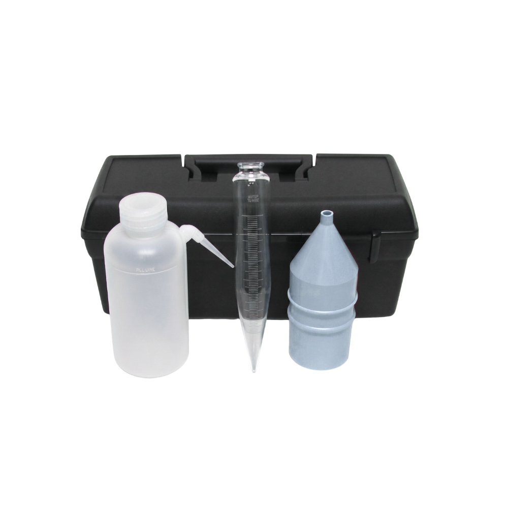 Sand content kit laid out with 200-mesh screen, polyethylene funnel, graduated glass measuring tube and wash bottle